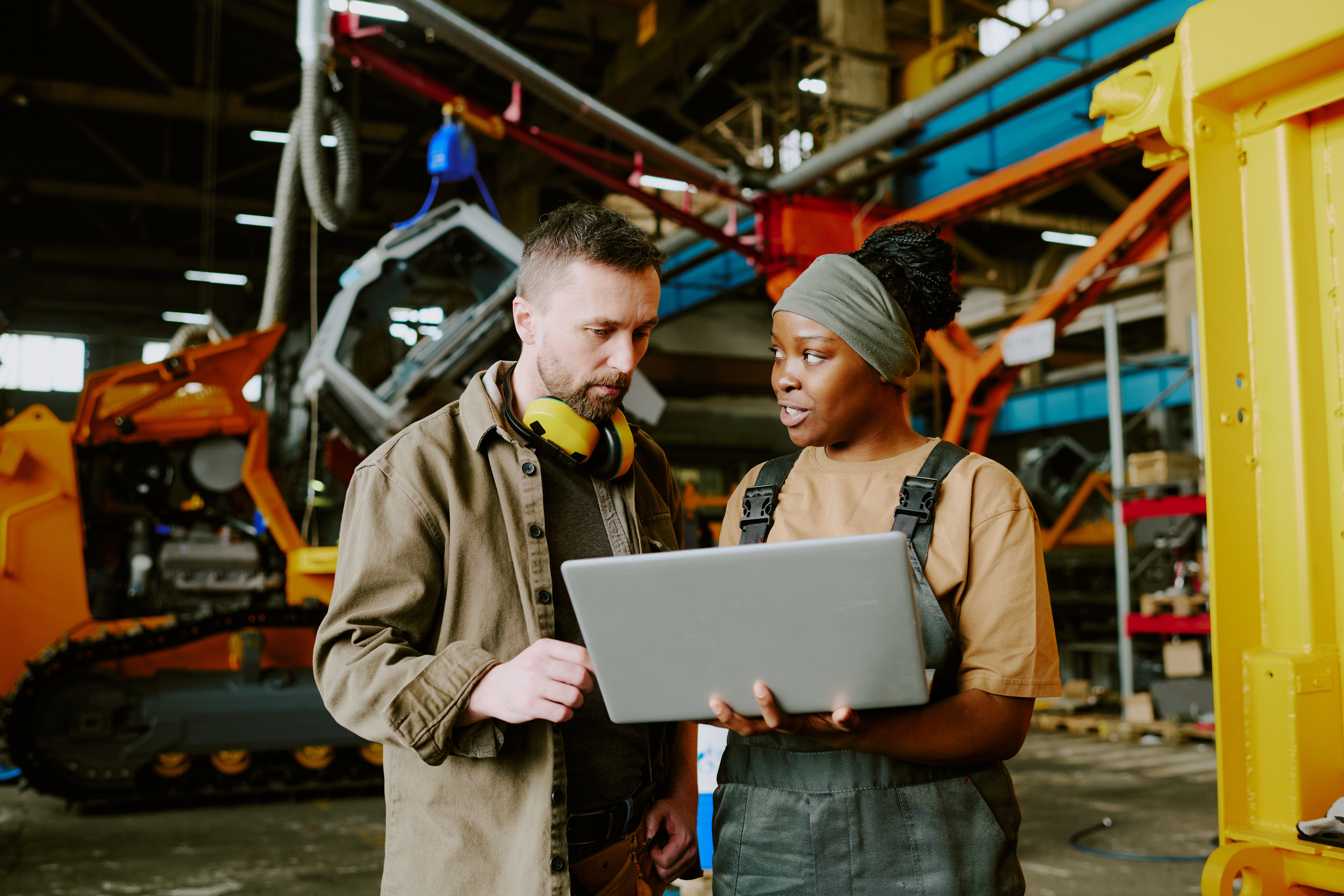 Factory Engineers Discussing Production Issues