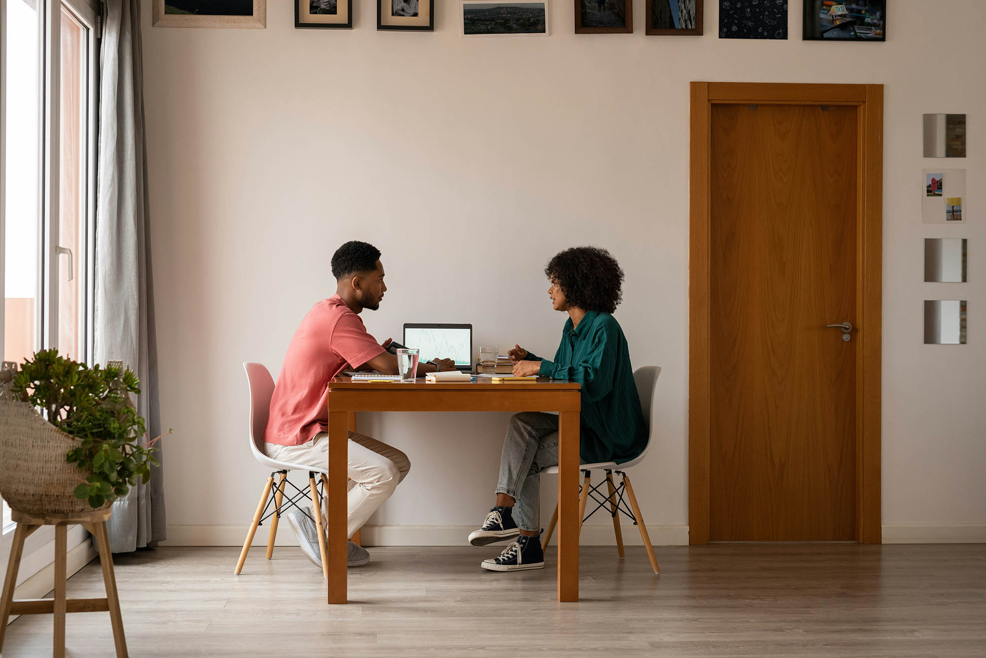 Two finance professionals collaborating at home office using Trintech Workiva integration to streamline financial close and reporting processes